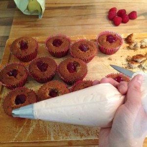 Filled cakes ready for piping